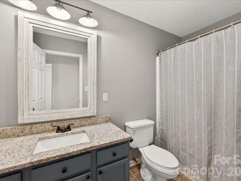 3002 Plyler Mill Road, Monroe, NC 28112.  MLS# CAR4330579, YatesRealty ID 16894. Second full bathroom