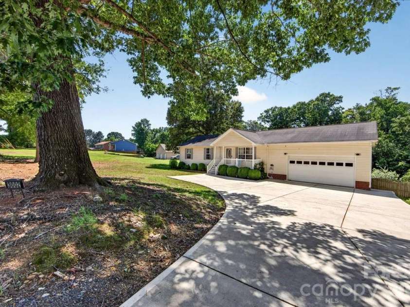 3002 Plyler Mill Road, Monroe, NC 28112.  MLS# CAR4330579, YatesRealty ID 16894. So much parking!