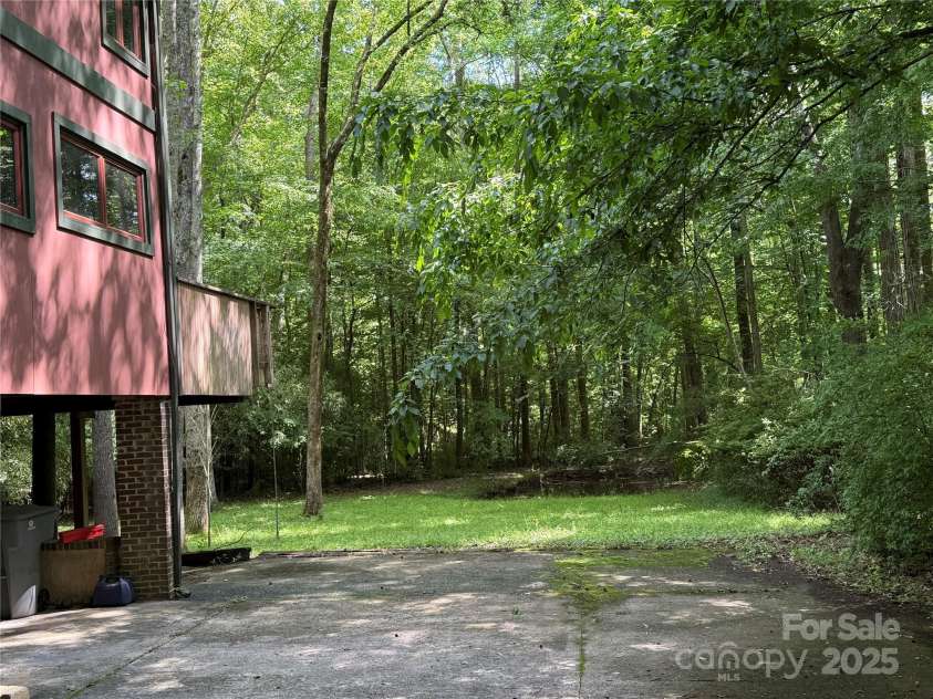 1451 Blueberry Lane, Charlotte, NC 28226.  MLS# CAR4258872, YatesRealty ID 16895. From Drive in back of home