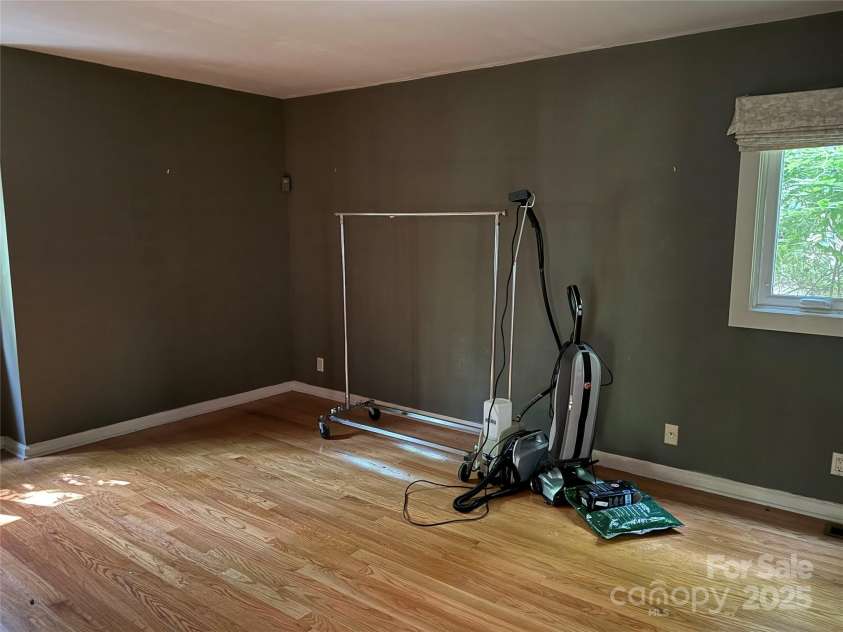 1451 Blueberry Lane, Charlotte, NC 28226.  MLS# CAR4258872, YatesRealty ID 16895. Main floor primary bedroom