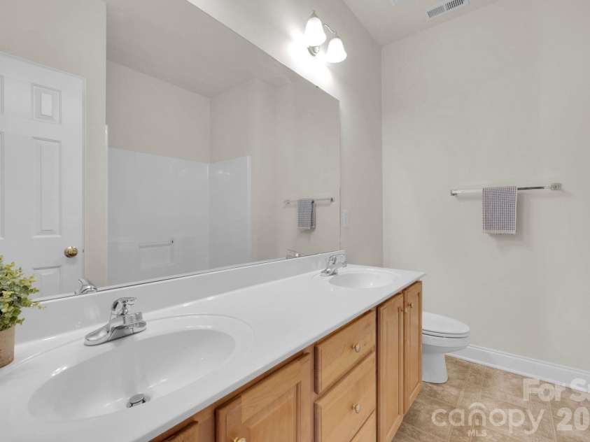 695 Summerford Court, Concord, NC 28027.  MLS# CAR4356212, YatesRealty ID 16895. Upper Bathroom