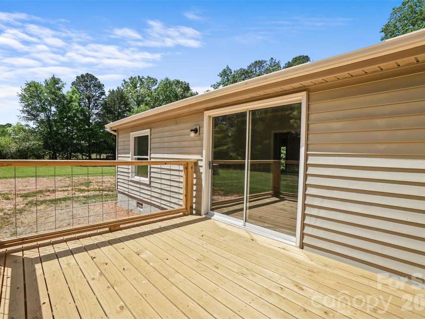 1305 Craig Drive, Iron Station, NC 28080.  MLS# CAR4371787, YatesRealty ID 16896. 