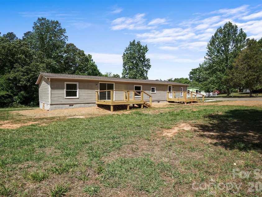 1305 Craig Drive, Iron Station, NC 28080.  MLS# CAR4371787, YatesRealty ID 16896. 