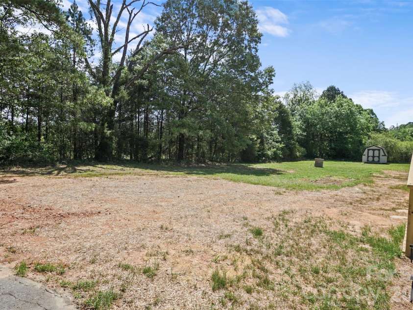 1305 Craig Drive, Iron Station, NC 28080.  MLS# CAR4371787, YatesRealty ID 16896. 
