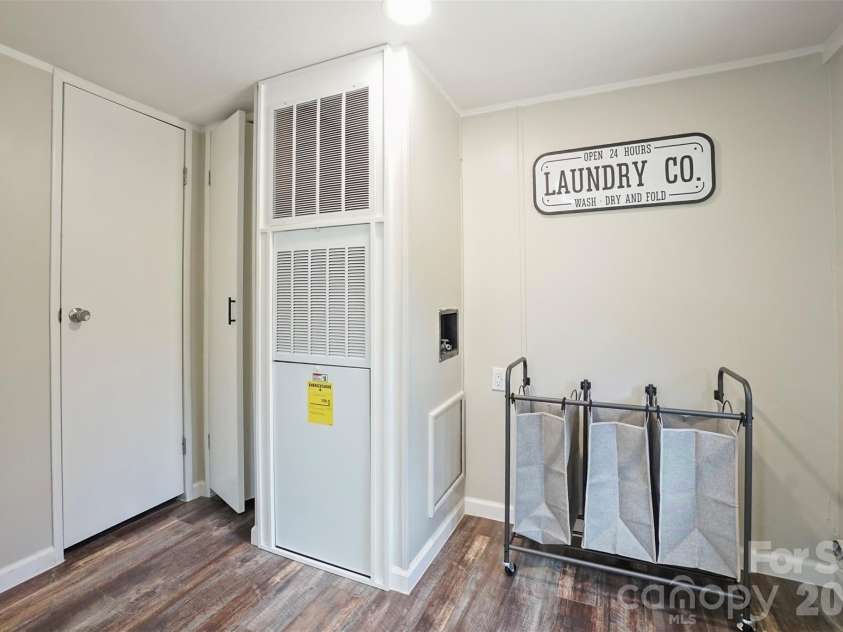 1305 Craig Drive, Iron Station, NC 28080.  MLS# CAR4371787, YatesRealty ID 16896. Laundry room