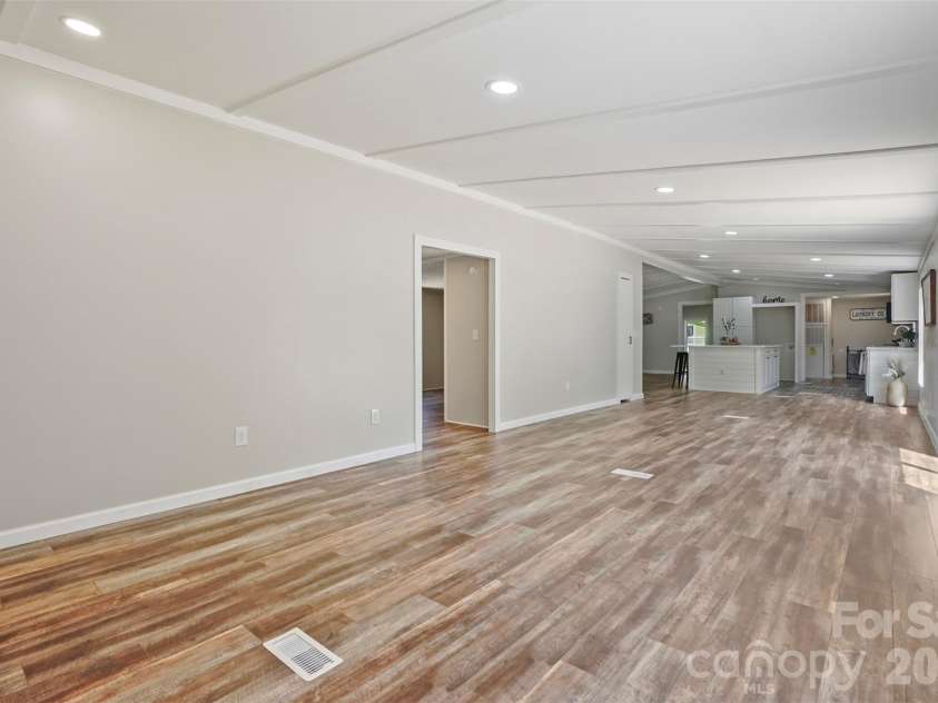 1305 Craig Drive, Iron Station, NC 28080.  MLS# CAR4371787, YatesRealty ID 16896. Living room