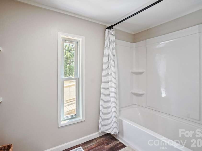 1305 Craig Drive, Iron Station, NC 28080.  MLS# CAR4371787, YatesRealty ID 16896. Master Bath