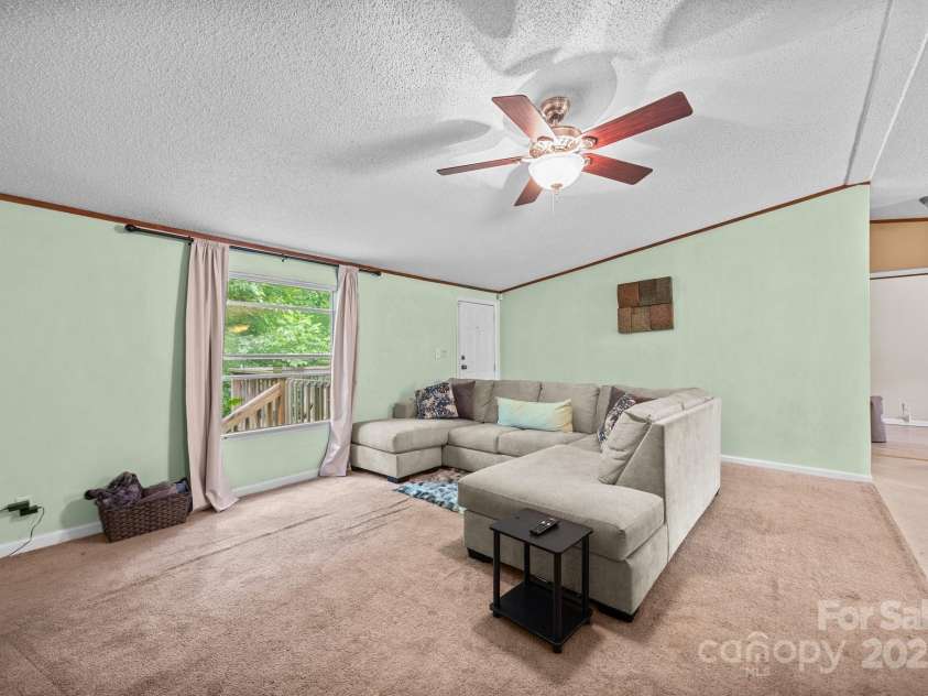 112 Cordella Road, Candler, NC 28715.  MLS# CAR4264603, YatesRealty ID 16904. 