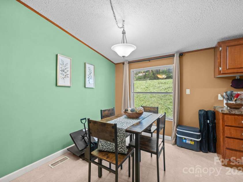 112 Cordella Road, Candler, NC 28715.  MLS# CAR4264603, YatesRealty ID 16904. 