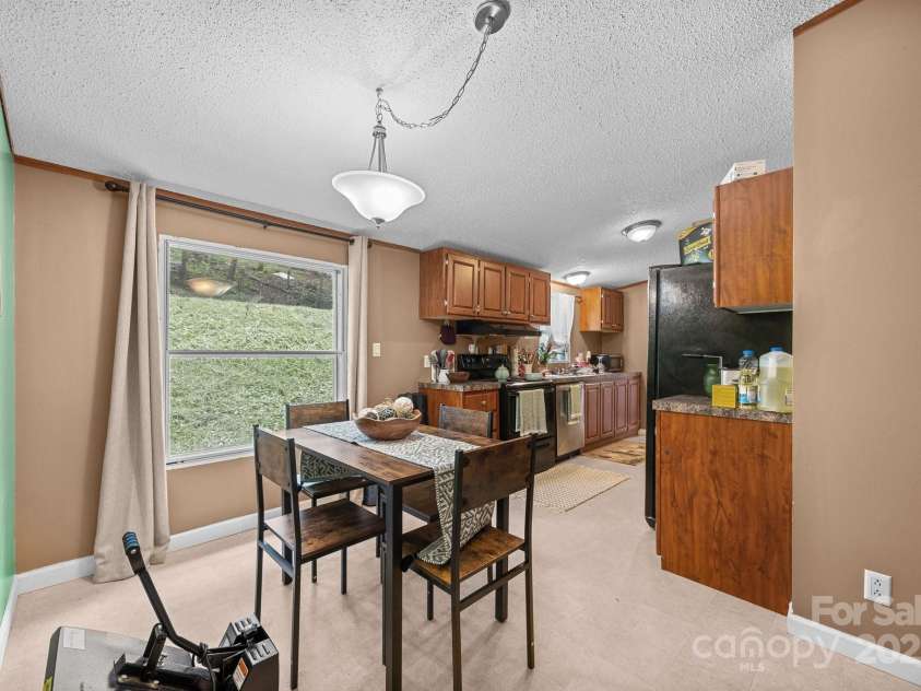 112 Cordella Road, Candler, NC 28715.  MLS# CAR4264603, YatesRealty ID 16904. 