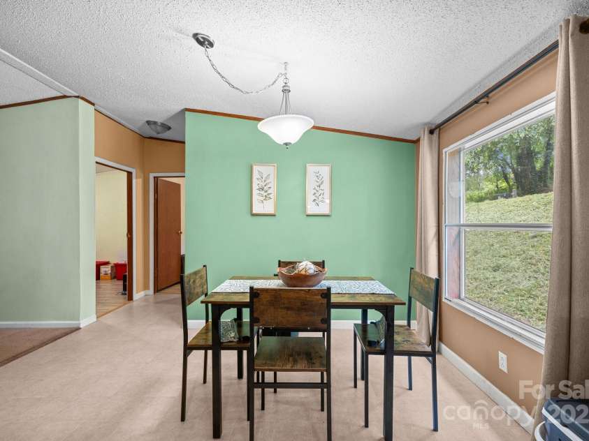 112 Cordella Road, Candler, NC 28715.  MLS# CAR4264603, YatesRealty ID 16904. 