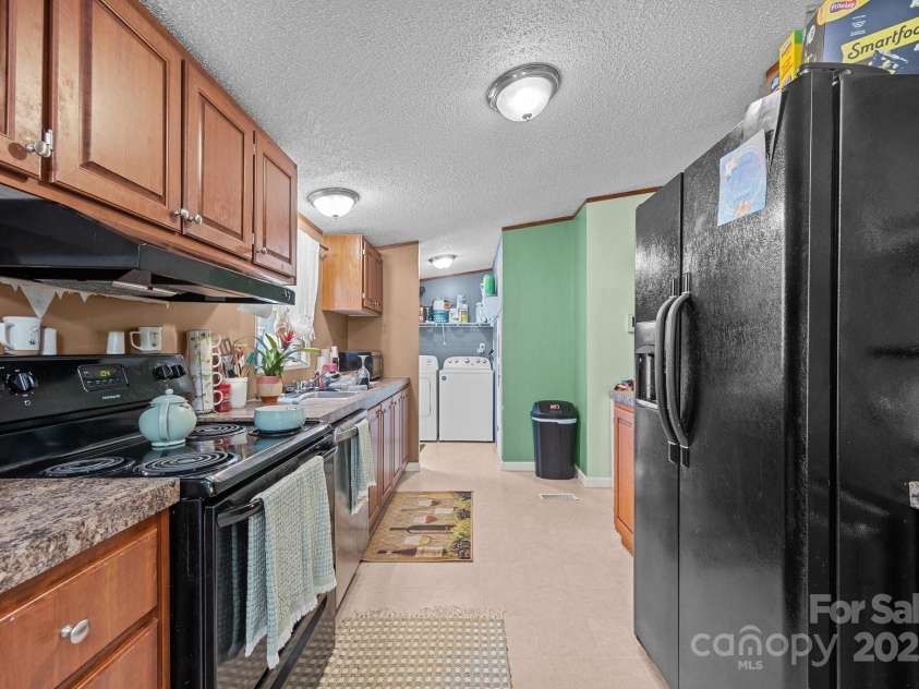 112 Cordella Road, Candler, NC 28715.  MLS# CAR4264603, YatesRealty ID 16904. 