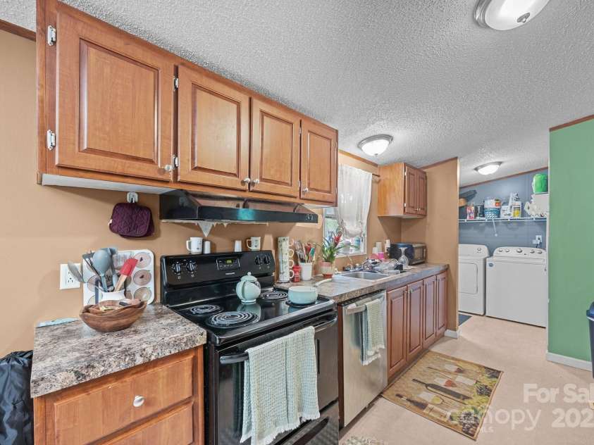 112 Cordella Road, Candler, NC 28715.  MLS# CAR4264603, YatesRealty ID 16904. 