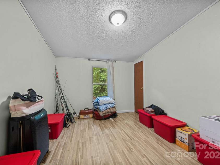 112 Cordella Road, Candler, NC 28715.  MLS# CAR4264603, YatesRealty ID 16904. Bedroom 2