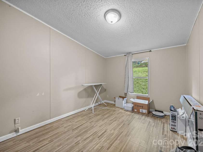 112 Cordella Road, Candler, NC 28715.  MLS# CAR4264603, YatesRealty ID 16904. Bedroom 3