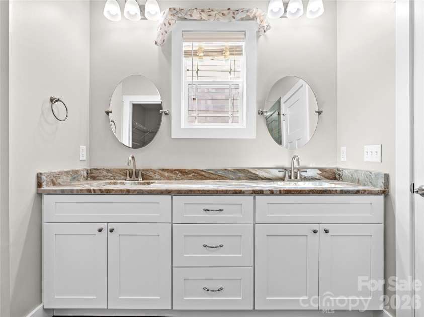 237 Leyland Circle, Hendersonville, NC 28792.  MLS# CAR4367023, YatesRealty ID 16905. Double vanity in the guest bathroom.