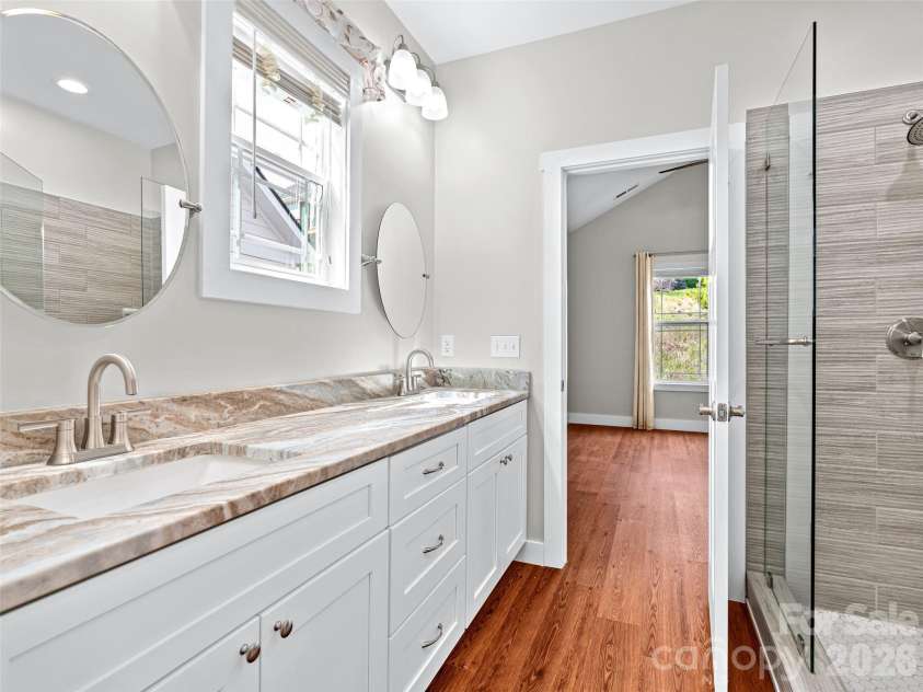 237 Leyland Circle, Hendersonville, NC 28792.  MLS# CAR4367023, YatesRealty ID 16905. Primary bathroom with double vanity.
