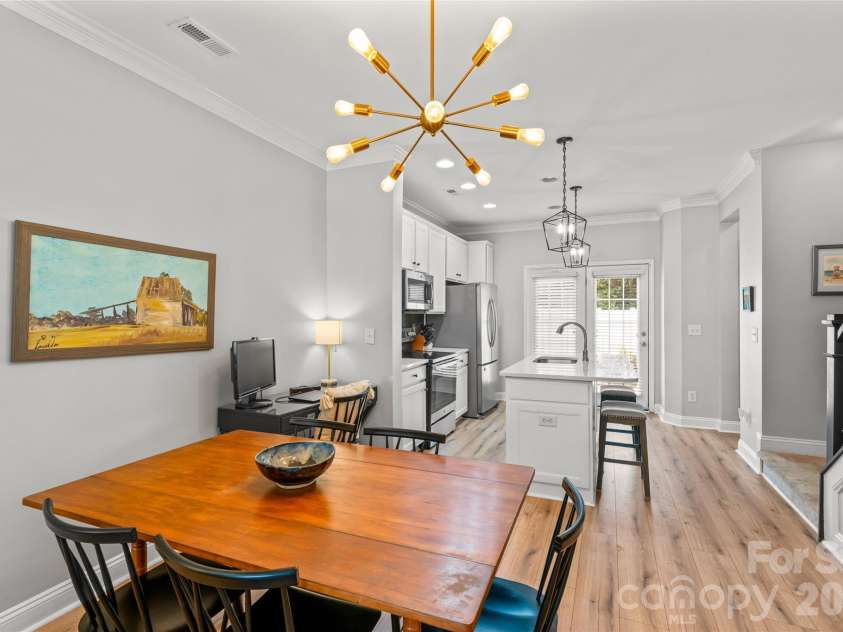 343 Hurston Circle, Charlotte, NC 28208.  MLS# CAR4353633, YatesRealty ID 16906. Dining area with updated trendy lighting