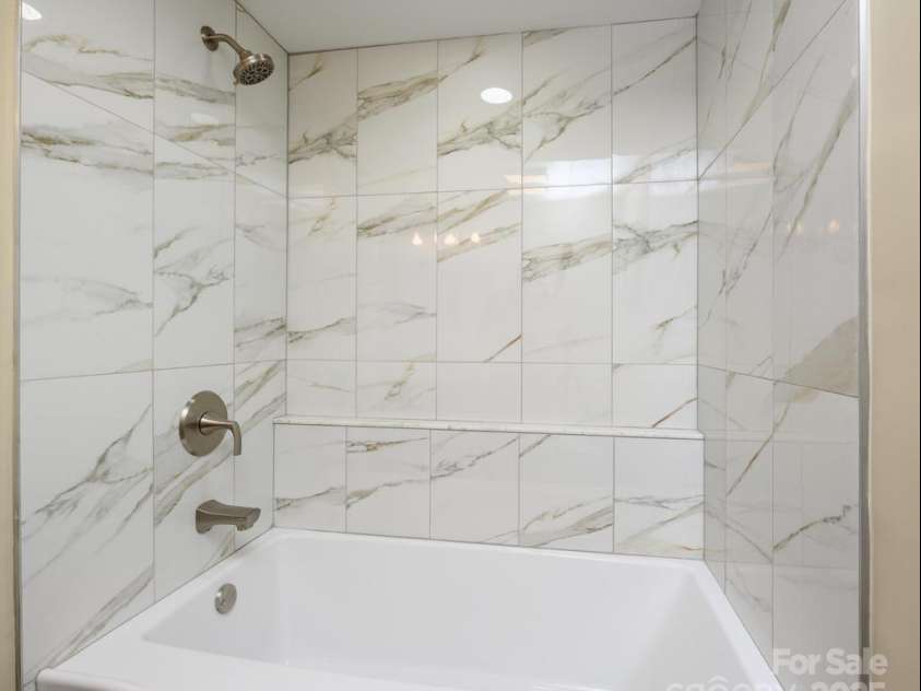 2106 Lynmore Drive, Sherrills Ford, NC 28673.  MLS# CAR4316248, YatesRealty ID 1691. Lower Level bathroom shower