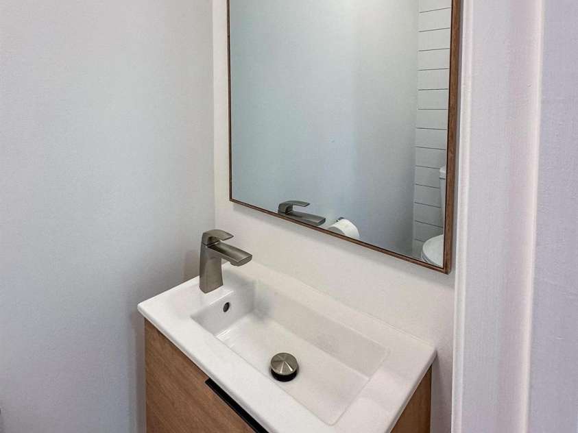 2106 Lynmore Drive, Sherrills Ford, NC 28673.  MLS# CAR4316248, YatesRealty ID 1691. Main level powder Room