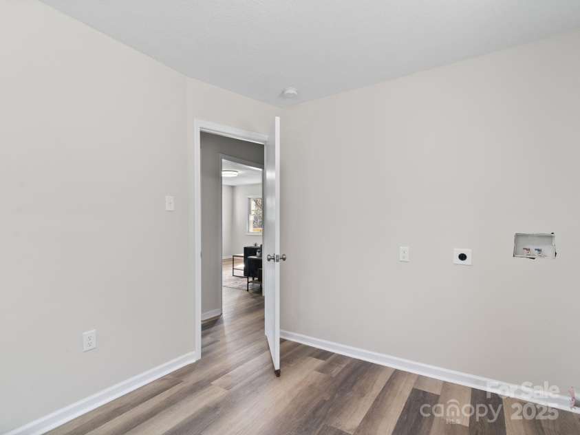 507 North Fork Road, Black Mountain, NC 28711.  MLS# CAR4243467, YatesRealty ID 16913. Fourth bedroom space currently used as laundry