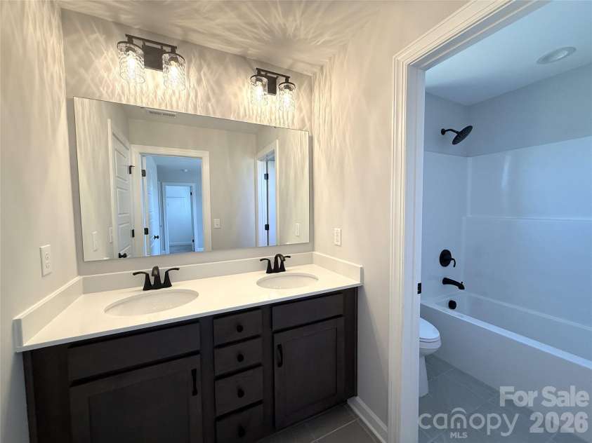 4048 Zinnia Drive, Harrisburg, NC 28075.  MLS# CAR4299454, YatesRealty ID 1692. Bath 2