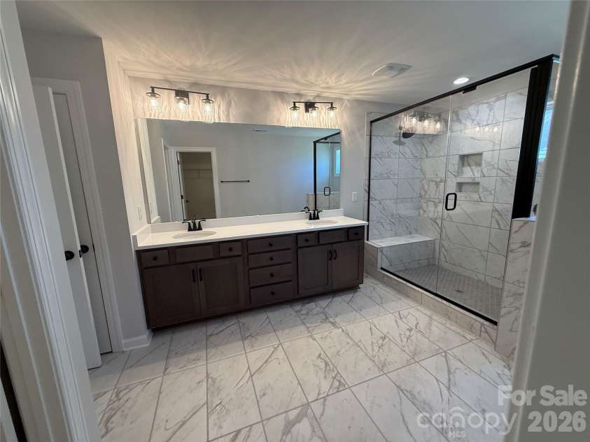 4048 Zinnia Drive, Harrisburg, NC 28075.  MLS# CAR4299454, YatesRealty ID 1692. Premier Bath