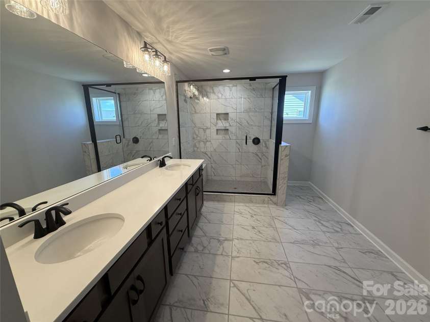 4048 Zinnia Drive, Harrisburg, NC 28075.  MLS# CAR4299454, YatesRealty ID 1692. Premier Bath