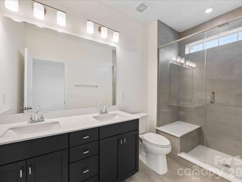647 District Court, Fort Mill, SC 29708.  MLS# CAR4346046, YatesRealty ID 16922. Primary bath 