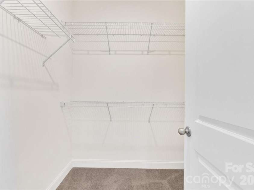 647 District Court, Fort Mill, SC 29708.  MLS# CAR4346046, YatesRealty ID 16922. Primary walk in closet 