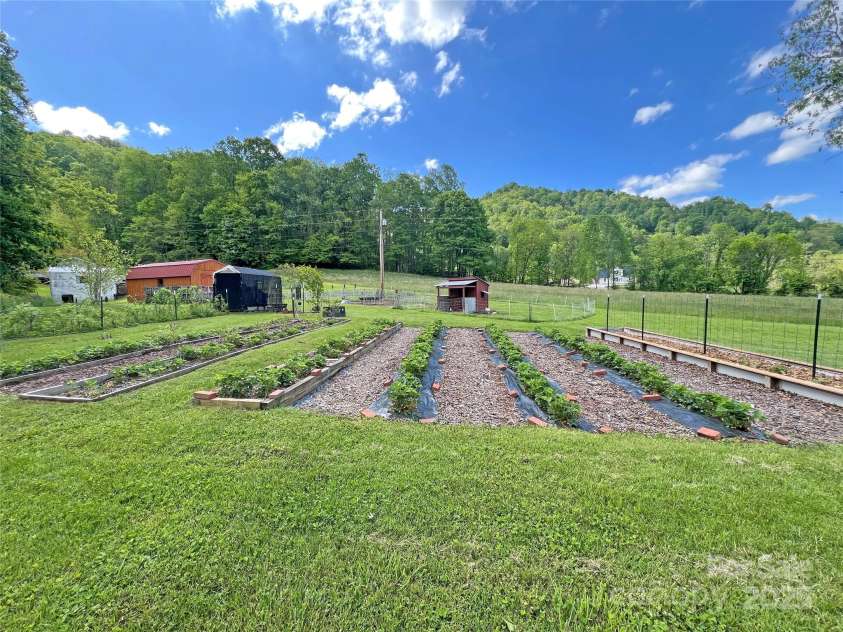 550 Joe Payne Road, Marshall, NC 28753.  MLS# CAR4257370, YatesRealty ID 16925. Gardens!