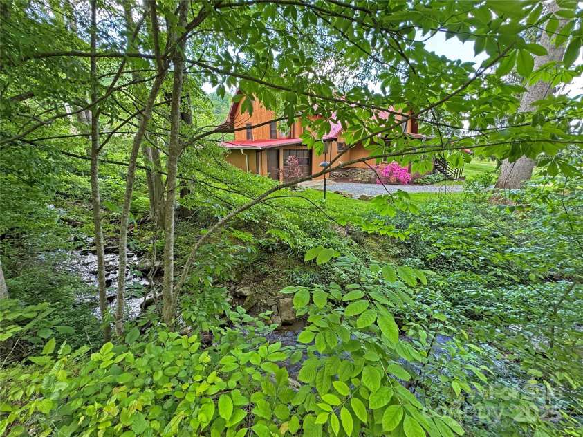 550 Joe Payne Road, Marshall, NC 28753.  MLS# CAR4257370, YatesRealty ID 16925. Peaceful Creekside Farm!