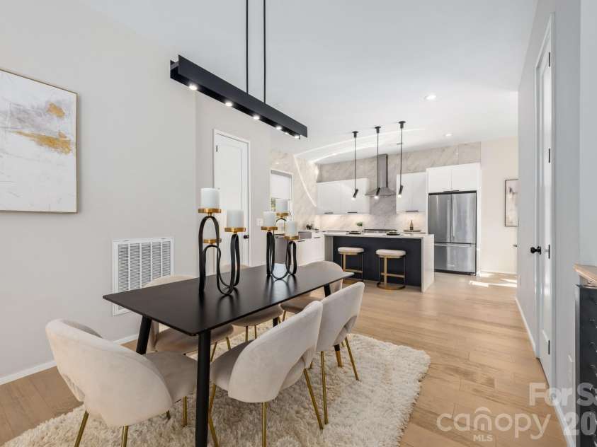 3108 Kirkland Avenue, Charlotte, NC 28208.  MLS# CAR4358724, YatesRealty ID 16926. Second level dining area