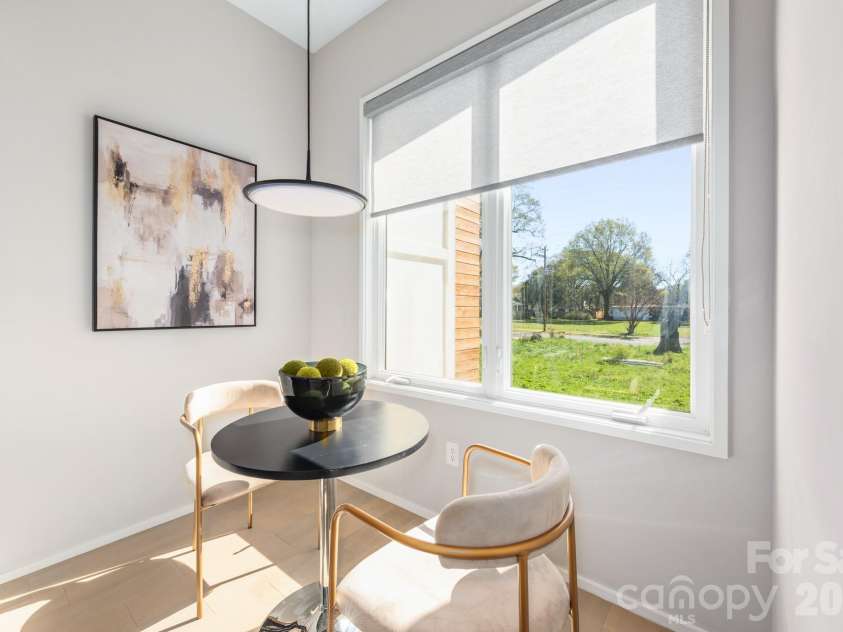 3108 Kirkland Avenue, Charlotte, NC 28208.  MLS# CAR4358724, YatesRealty ID 16926. Second level kitchen table nook