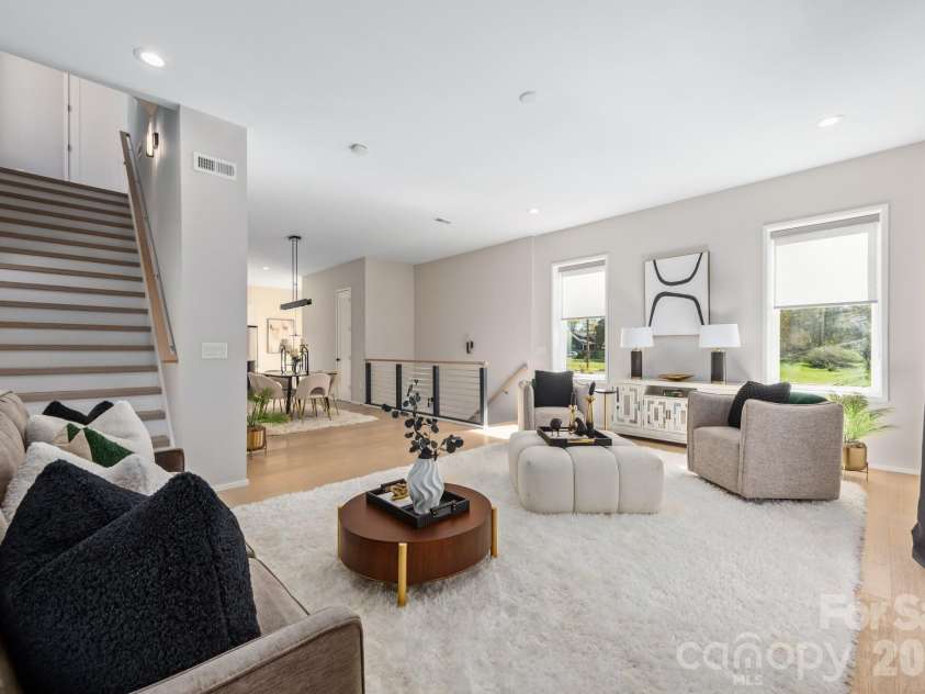 3108 Kirkland Avenue, Charlotte, NC 28208.  MLS# CAR4358724, YatesRealty ID 16926. Second level living room