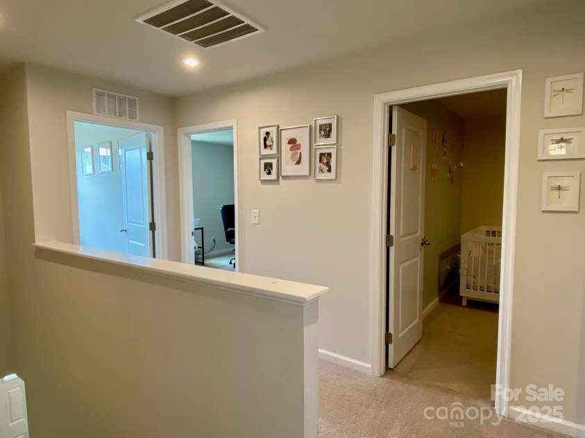 3113 Bouquet Street, Charlotte, NC 28215.  MLS# CAR4261587, YatesRealty ID 16926. Upstairs Hallway