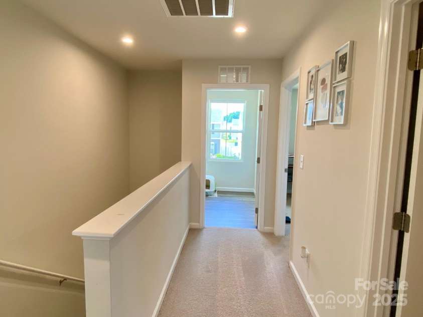 3113 Bouquet Street, Charlotte, NC 28215.  MLS# CAR4261587, YatesRealty ID 16926. Upstairs Hallway