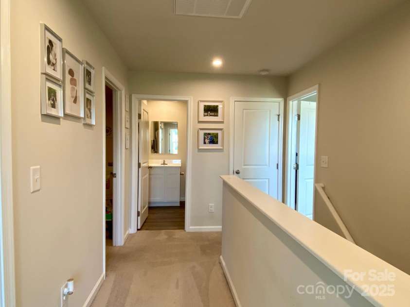3113 Bouquet Street, Charlotte, NC 28215.  MLS# CAR4261587, YatesRealty ID 16926. Upstairs Hallway