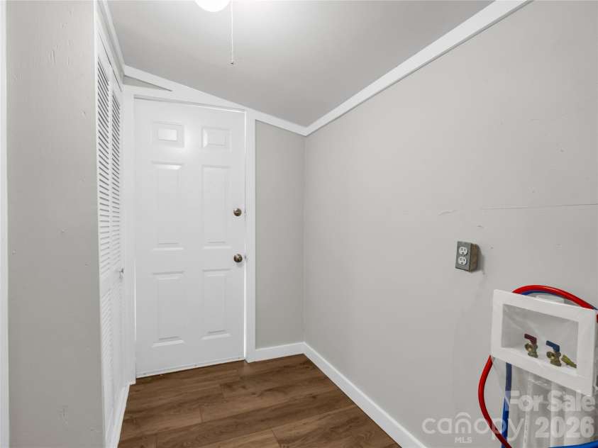 198 Grayson Bostic Road, Forest City, NC 28043.  MLS# CAR4360050, YatesRealty ID 16930. Laundry Outside door to backyard