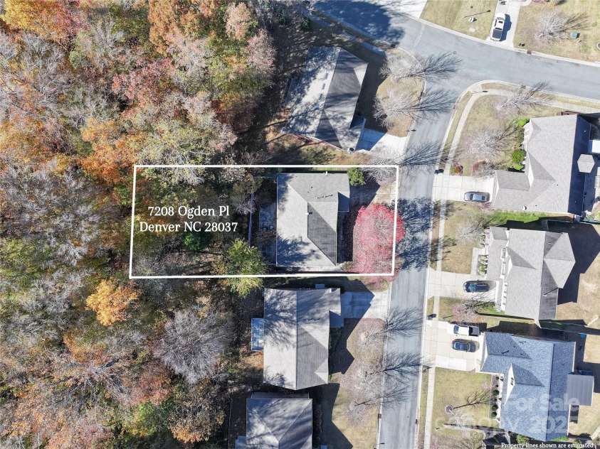 7208 Ogden Place, Denver, NC 28037.  MLS# CAR4318593, YatesRealty ID 16931. Gorgeous tree band in the backyard