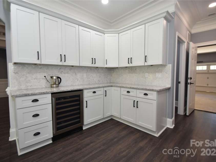 6519 Pargo Road, Charlotte, NC 28216.  MLS# CAR4246671, YatesRealty ID 16937. Beverage refrigerator and lots of storage!