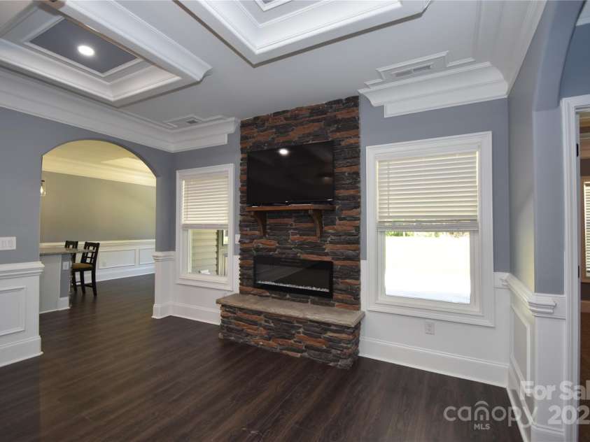 6519 Pargo Road, Charlotte, NC 28216.  MLS# CAR4246671, YatesRealty ID 16937. Living Room looking toward Dining.