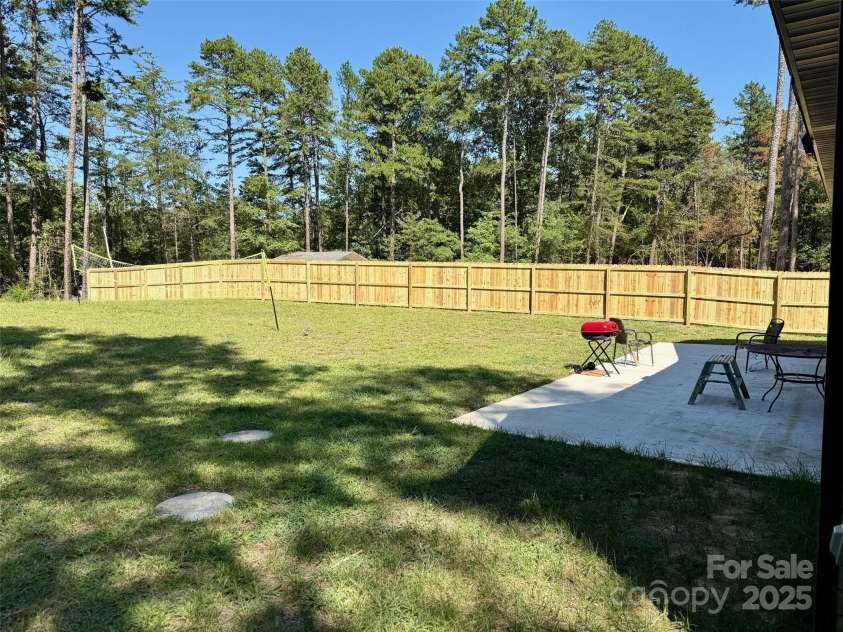 6519 Pargo Road, Charlotte, NC 28216.  MLS# CAR4246671, YatesRealty ID 16937. New wood privacy fence