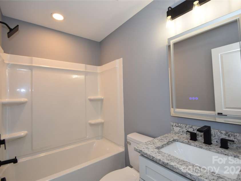 6519 Pargo Road, Charlotte, NC 28216.  MLS# CAR4246671, YatesRealty ID 16937. Upstairs Bathroom.