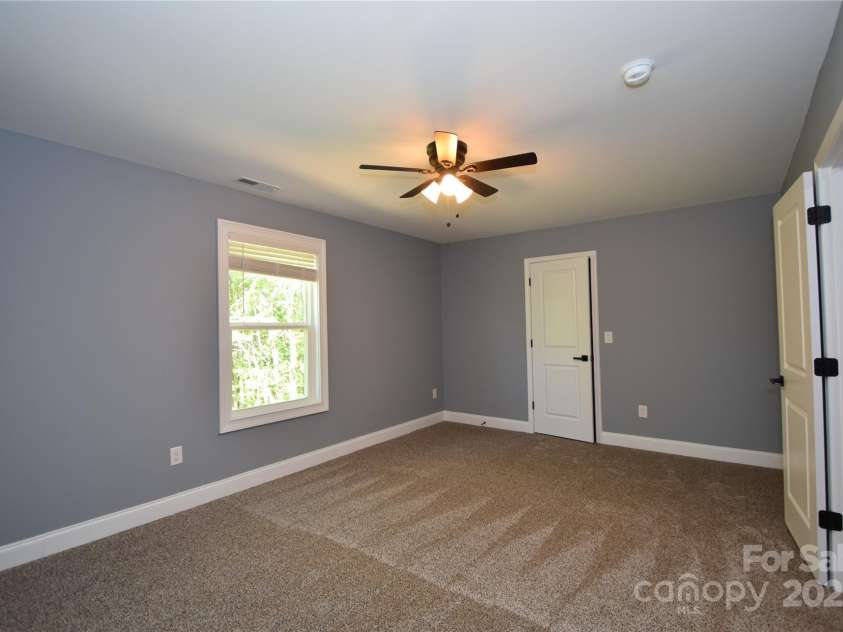 6519 Pargo Road, Charlotte, NC 28216.  MLS# CAR4246671, YatesRealty ID 16937. Upstairs Bedroom.