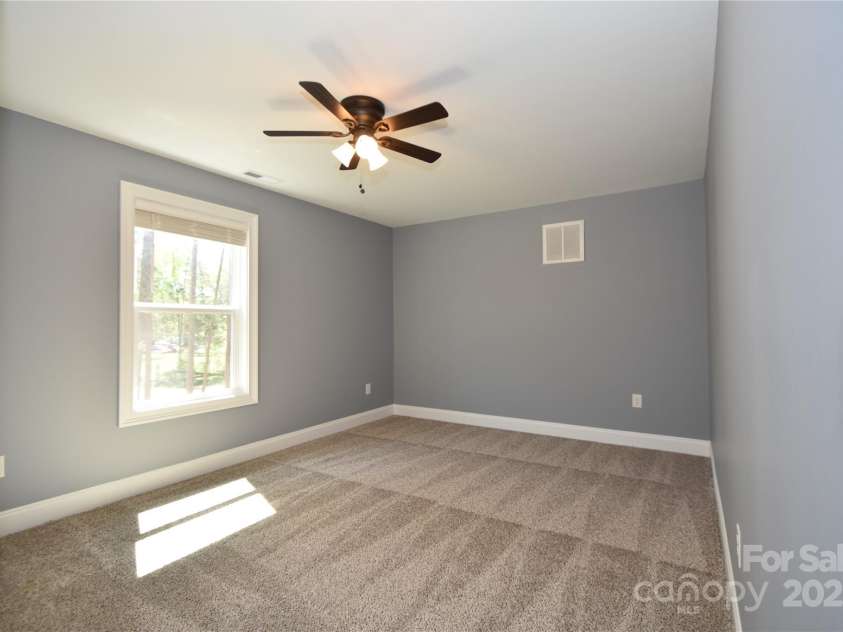6519 Pargo Road, Charlotte, NC 28216.  MLS# CAR4246671, YatesRealty ID 16937. Upstairs Secondary Bedroom.