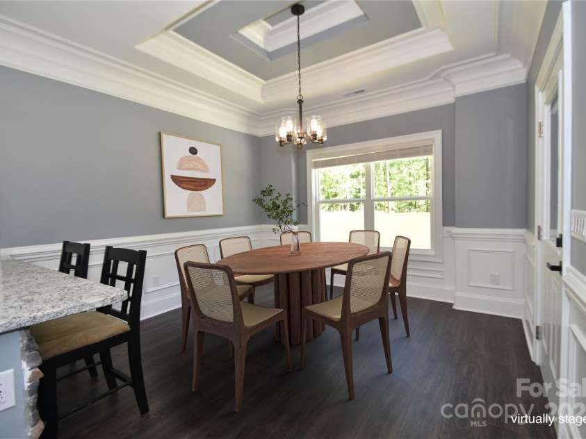 6519 Pargo Road, Charlotte, NC 28216.  MLS# CAR4246671, YatesRealty ID 16937. Virtually staged dining area.