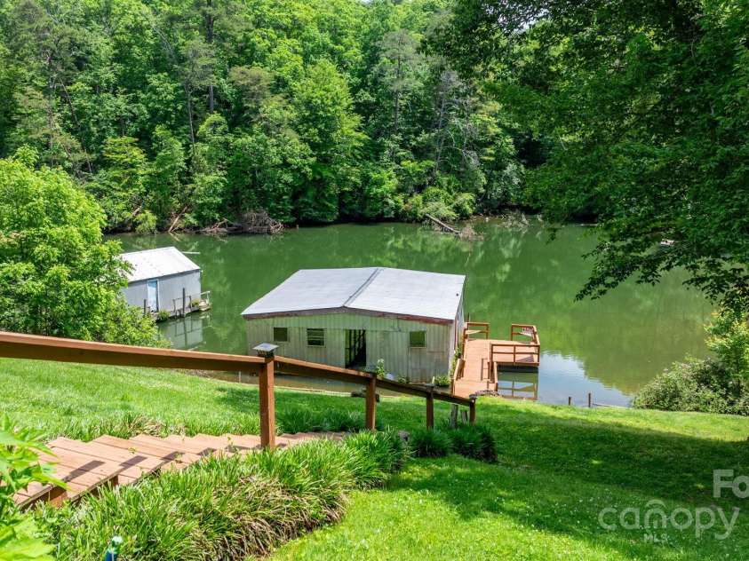 6256 Monford Drive, Conover, NC 28613.  MLS# CAR4261002, YatesRealty ID 16939. Backyard leading to lake
