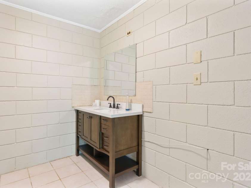 6256 Monford Drive, Conover, NC 28613.  MLS# CAR4261002, YatesRealty ID 16939. Bathroom downstairs