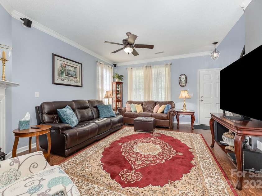 411 Summergate Drive, Winston Salem, NC 27103.  MLS# CAR4264420, YatesRealty ID 16942. Living room ready for popcorn, movie nights and new memories to be made.